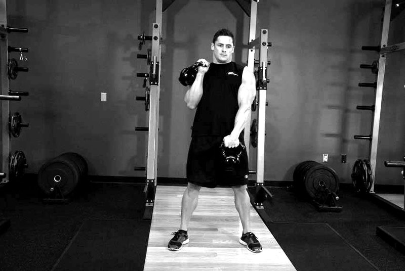 Alternating Hang Clean — end position demonstration photo