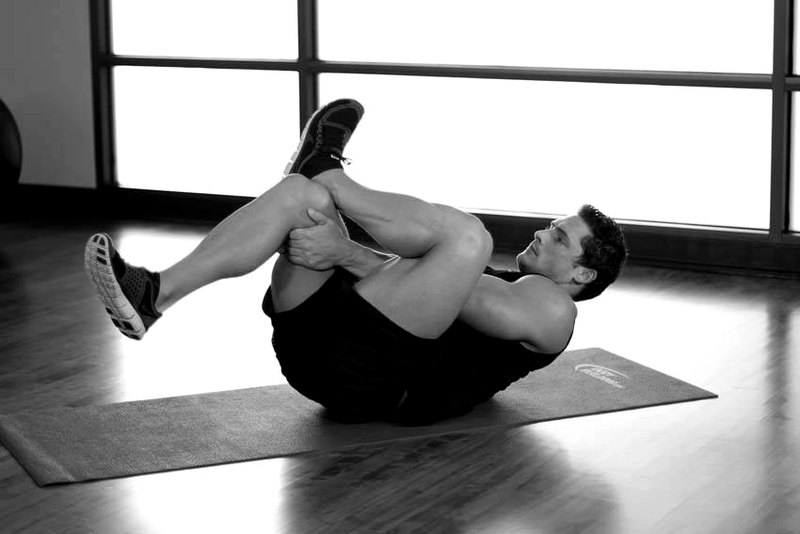 Ankle On The Knee — end position demonstration photo