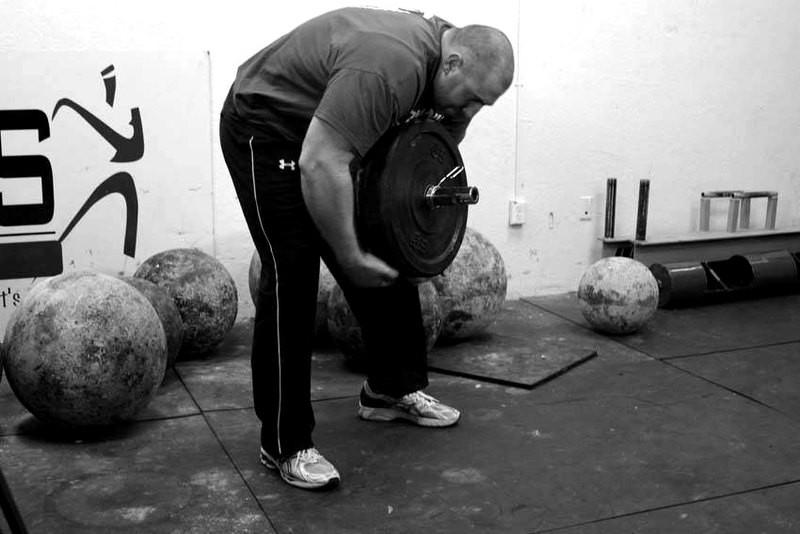 Atlas Stone Trainer — end position demonstration photo