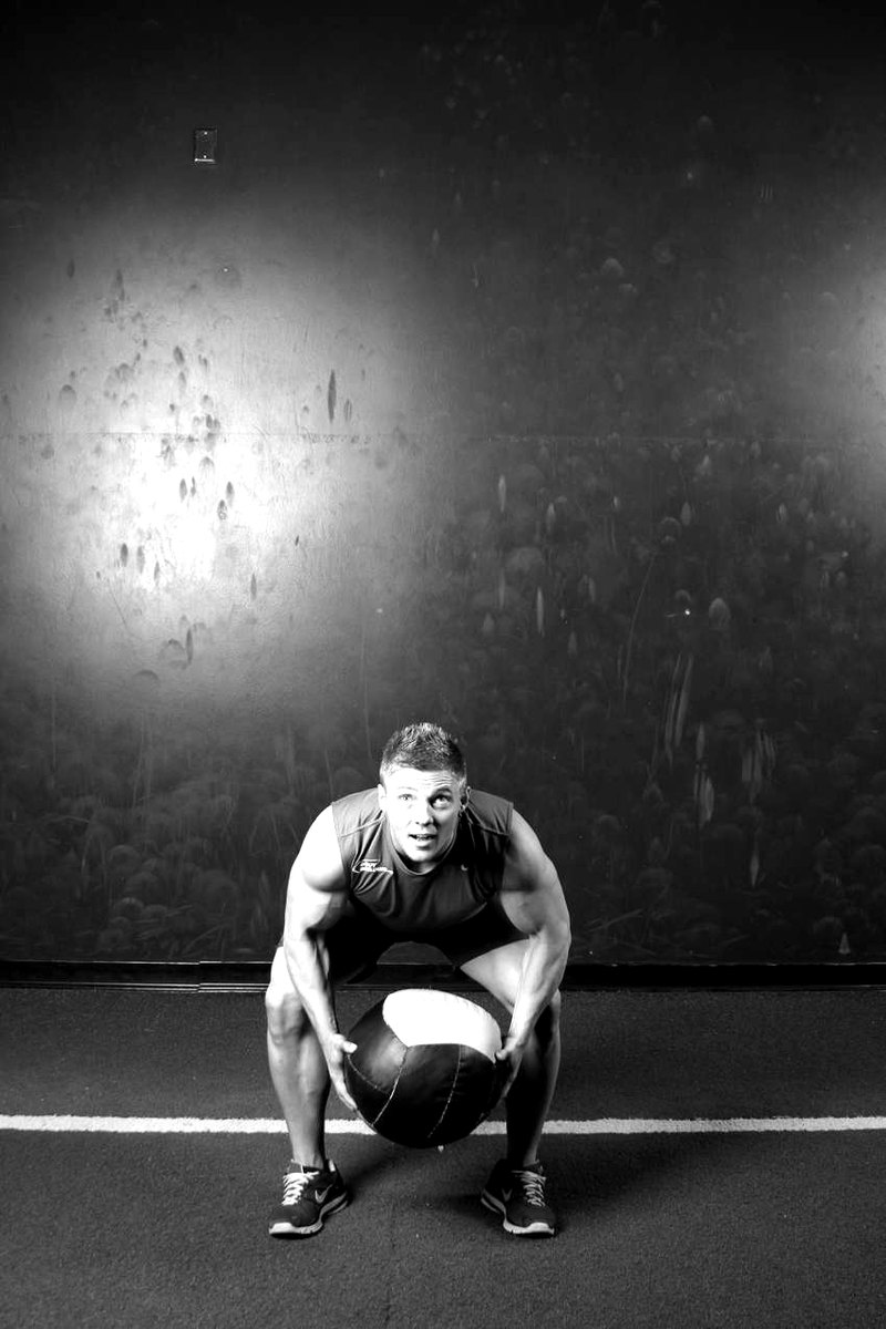 Backward Medicine Ball Throw — start position demonstration photo