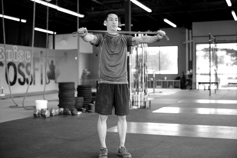 Band Pull Apart — start position demonstration photo