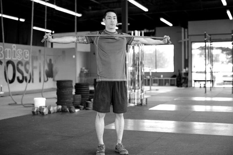 Band Pull Apart — end position demonstration photo