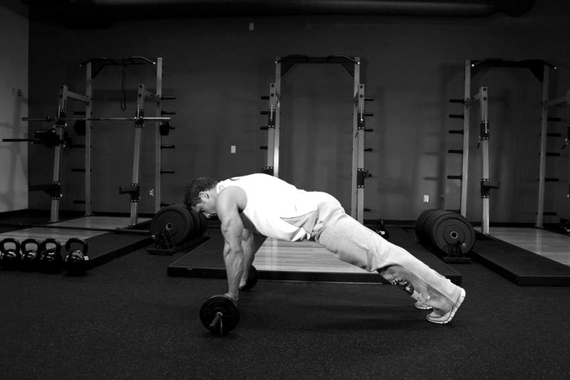 Barbell Ab Rollout — end position demonstration photo