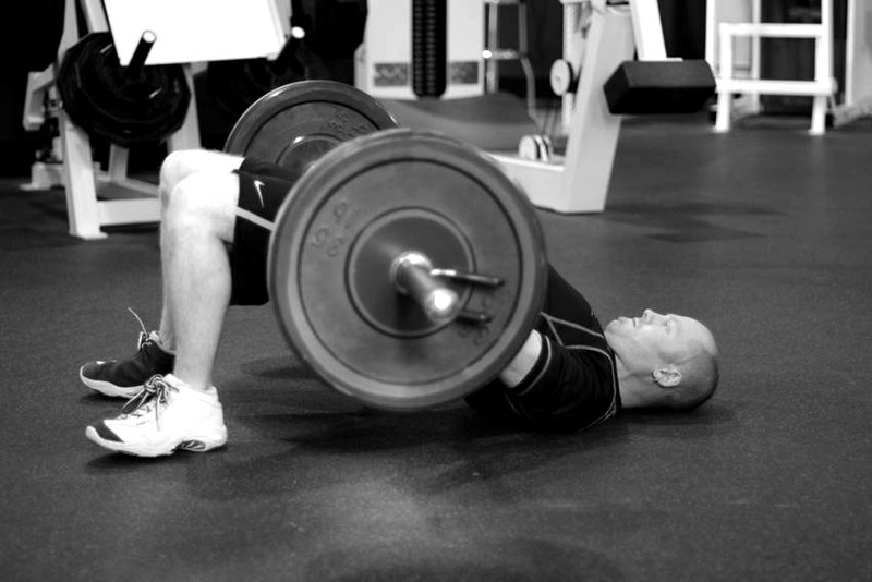 Barbell Glute Bridge — end position demonstration photo