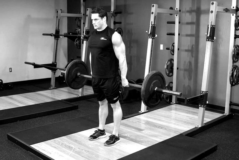 Barbell Hack Squat — end position demonstration photo