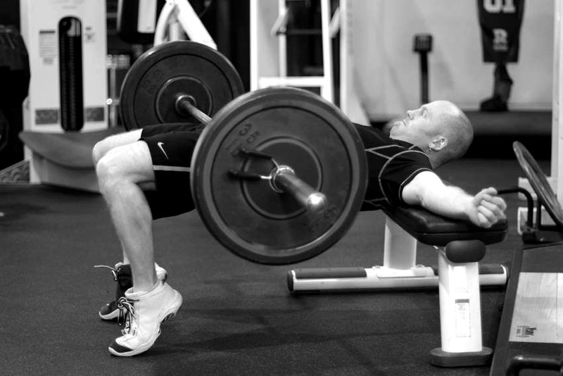 Barbell Hip Thrust — end position demonstration photo