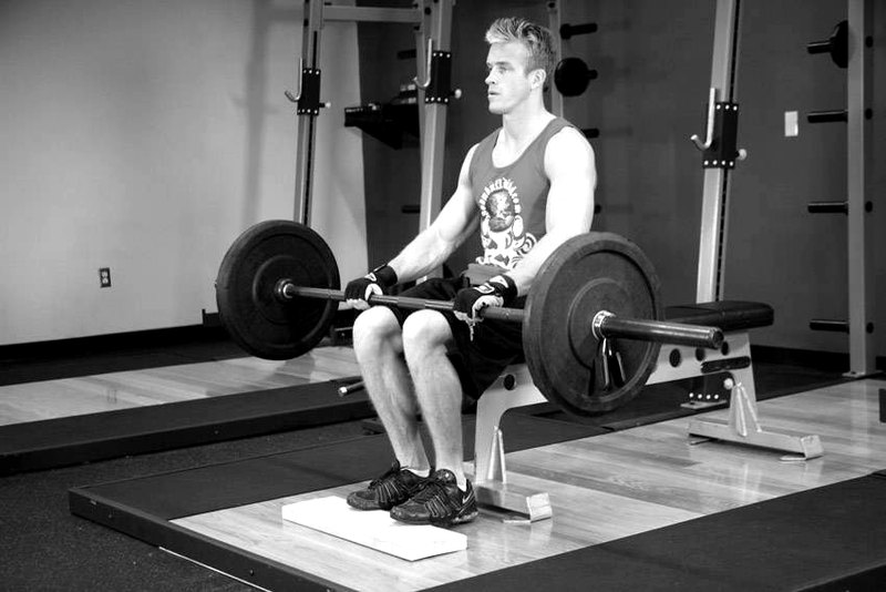 Barbell Seated Calf Raise — start position demonstration photo