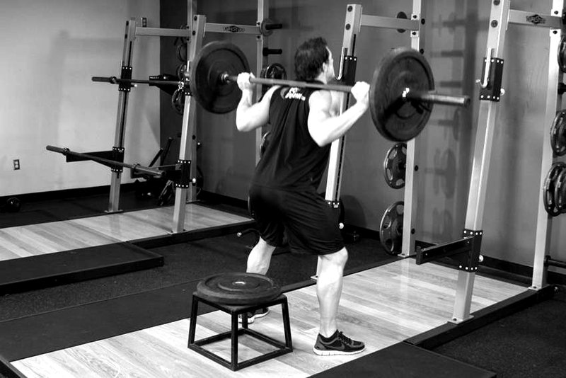 Barbell Squat To A Bench — start position demonstration photo