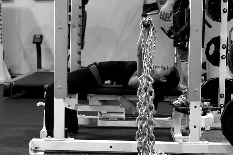 Bench Press with Chains — end position demonstration photo