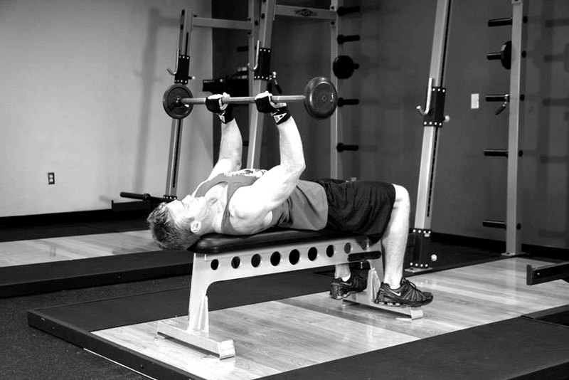 Bent-Arm Barbell Pullover — end position demonstration photo