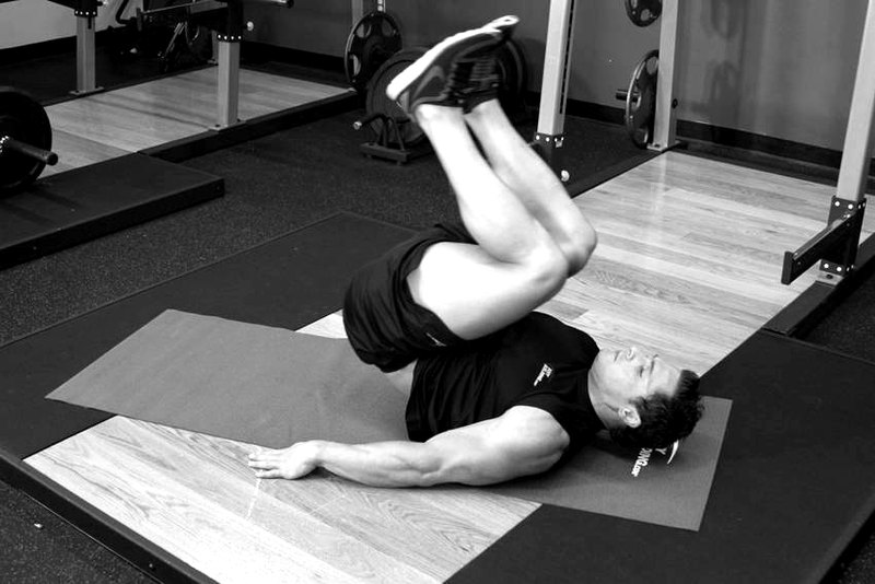 Bent-Knee Hip Raise — end position demonstration photo