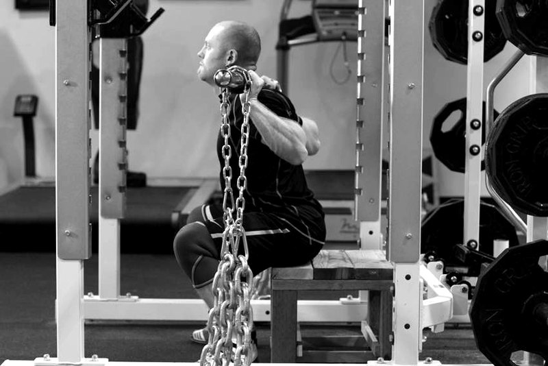 Box Squat with Chains — end position demonstration photo