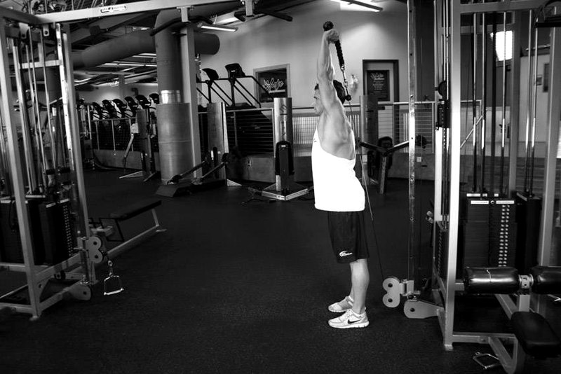 Cable Rope Overhead Triceps Extension — end position demonstration photo
