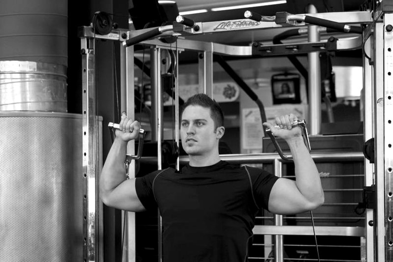 Cable Shoulder Press — start position demonstration photo