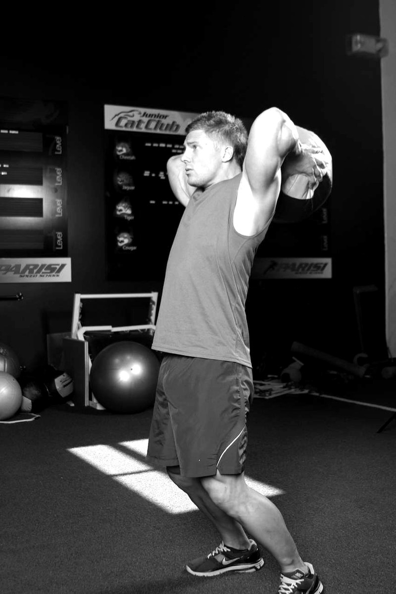 Catch and Overhead Throw — end position demonstration photo