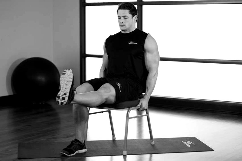 Chair Leg Extended Stretch — end position demonstration photo
