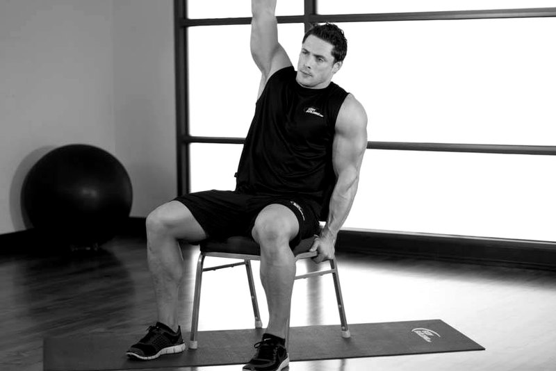 Chair Lower Back Stretch — end position demonstration photo