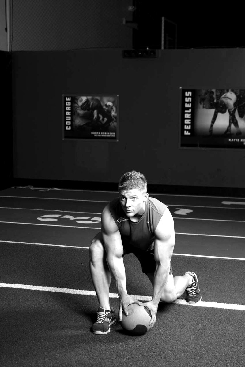 Chest Push from 3 point stance — end position demonstration photo