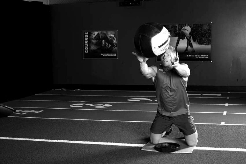 Chest Push (single response) — end position demonstration photo