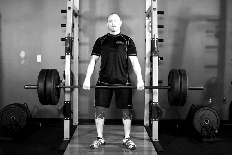 Clean Shrug — start position demonstration photo