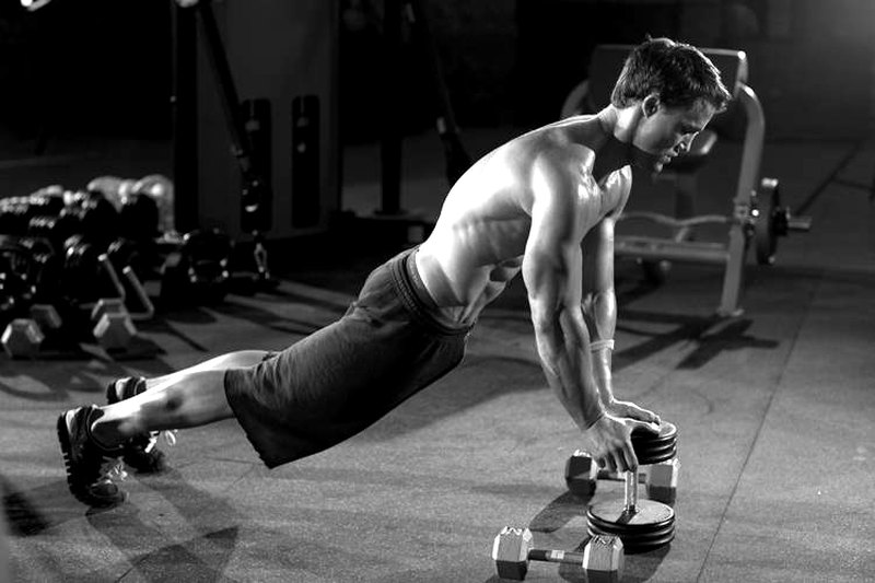 Close-Grip Push-Up off of a Dumbbell — start position demonstration photo