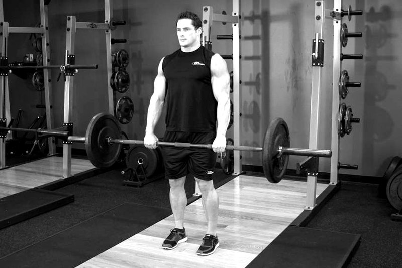 Conventional Deadlift — end position demonstration photo