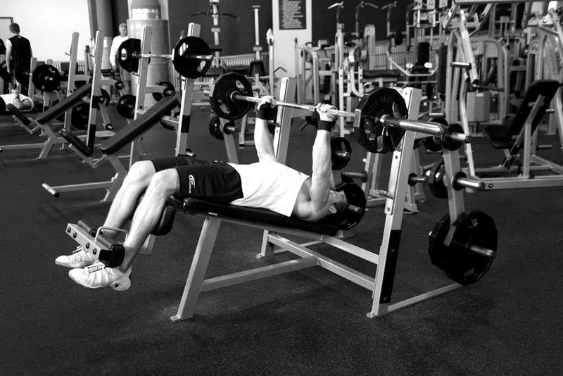 Decline Barbell Bench Press — end position demonstration photo