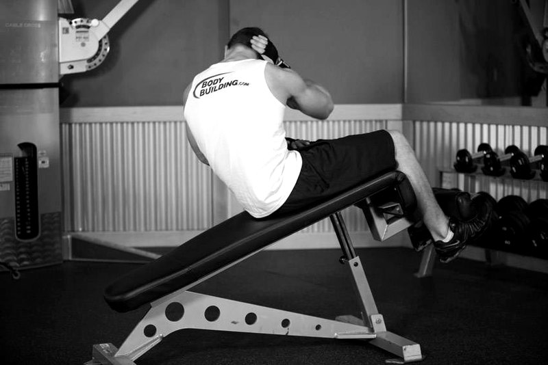 Decline Oblique Crunch — end position demonstration photo