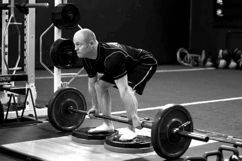 Deficit Deadlift — start position demonstration photo