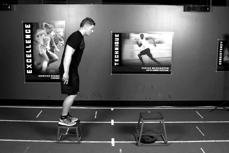 Depth Jump Leap — start position demonstration photo