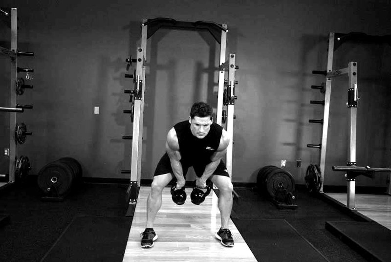 Double Kettlebell Snatch — end position demonstration photo