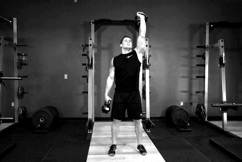 Double Kettlebell Windmill — start position demonstration photo