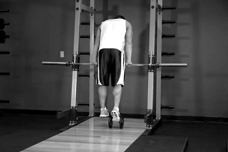 Dumbbell Calf Raise — end position demonstration photo