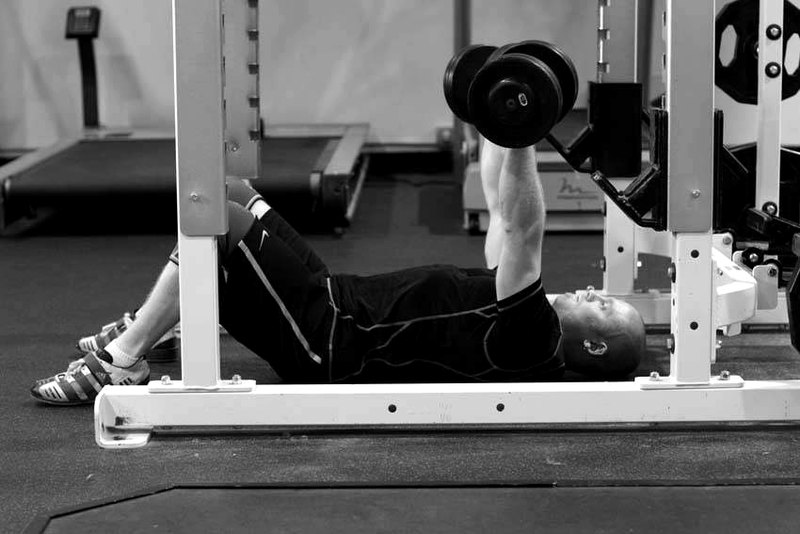 Dumbbell Floor Press — start position demonstration photo