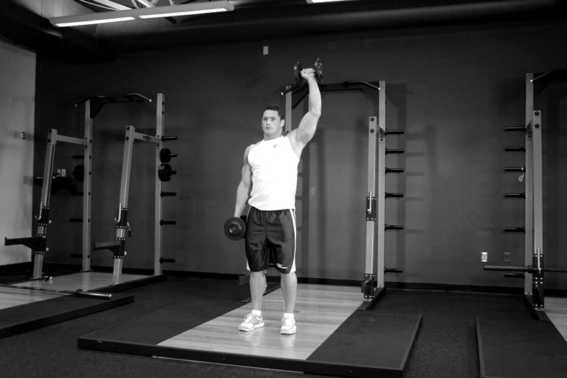 Dumbbell One-Arm Shoulder Press — end position demonstration photo