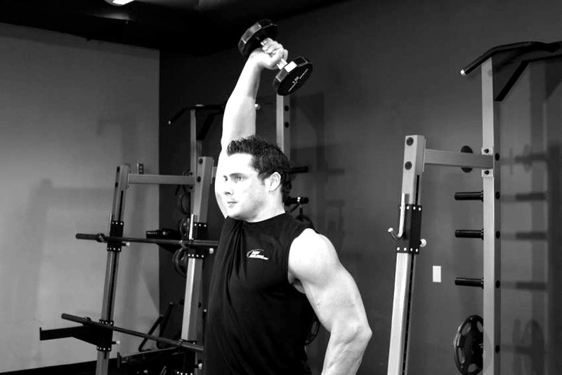 Dumbbell One-Arm Triceps Extension — end position demonstration photo