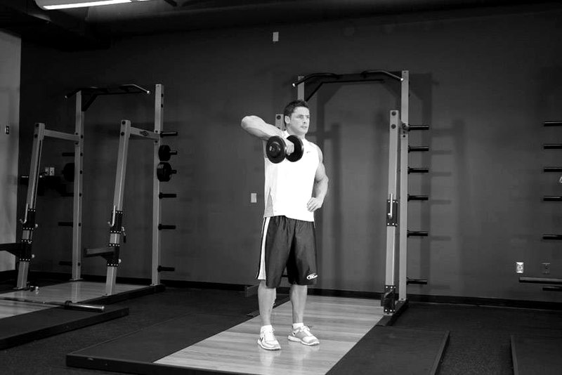 Dumbbell One-Arm Upright Row — start position demonstration photo