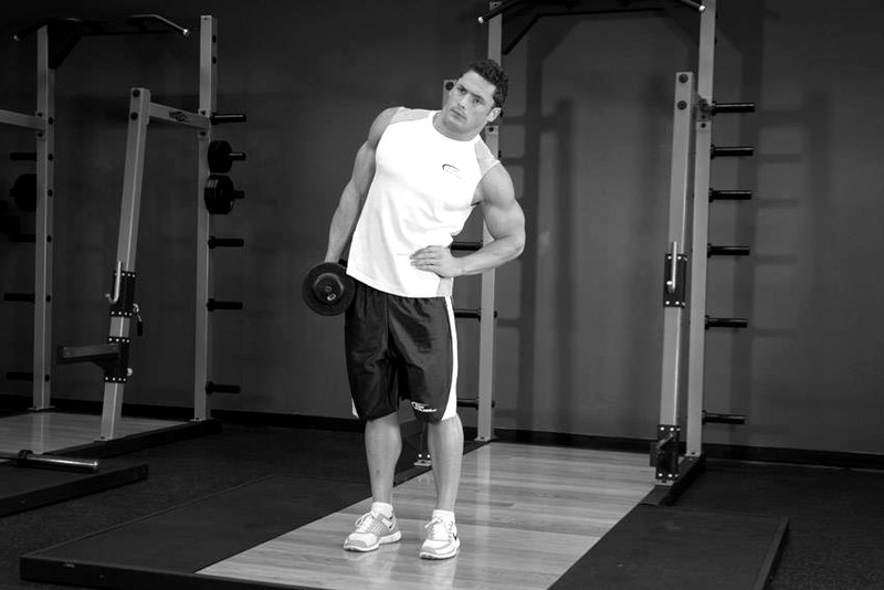 Dumbbell Side Bend — end position demonstration photo