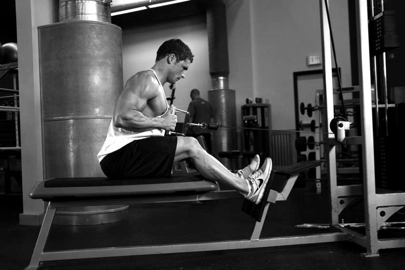 Elevated Cable Rows — end position demonstration photo