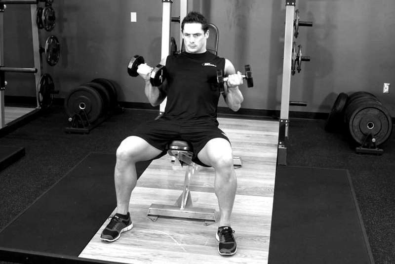 Flexor Incline Dumbbell Curls — end position demonstration photo