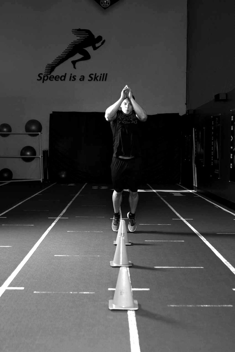 Front Cone Hops (or hurdle hops) — start position demonstration photo
