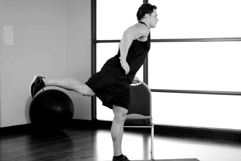 Front Leg Raises — end position demonstration photo