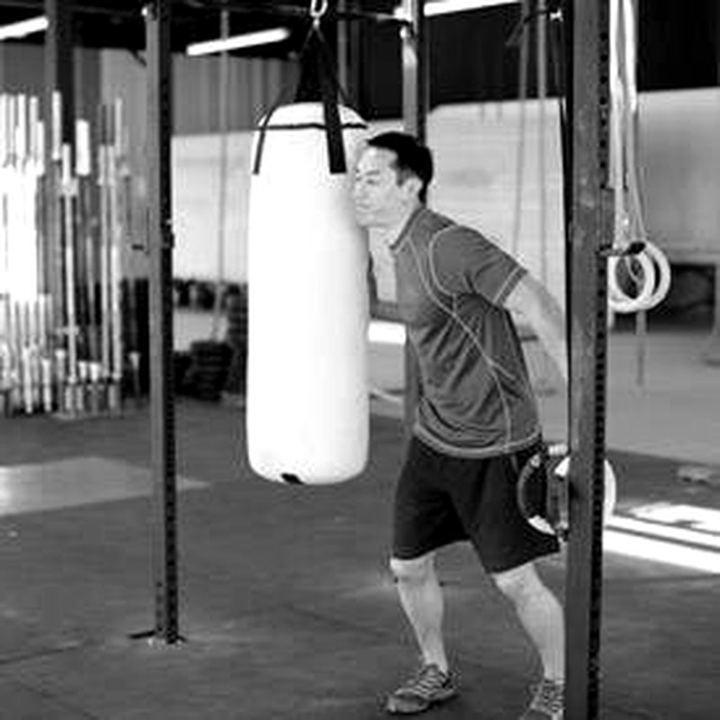 Heavy Bag Thrust — start position demonstration photo