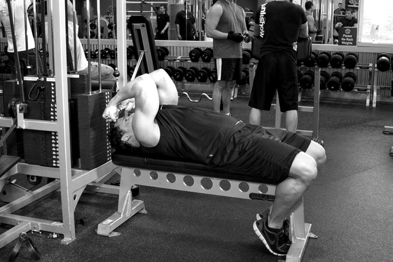 High Cable Curls — end position demonstration photo