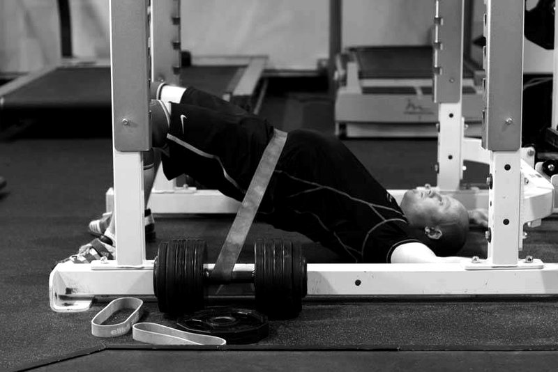 Hip Lift with Band — end position demonstration photo