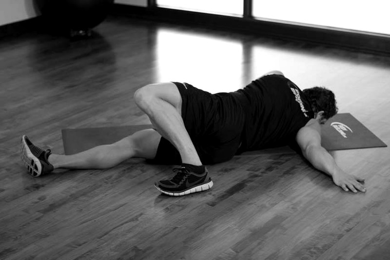 Iron Crosses (stretch) — end position demonstration photo