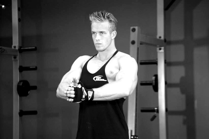 Isometric Chest Squeezes — start position demonstration photo