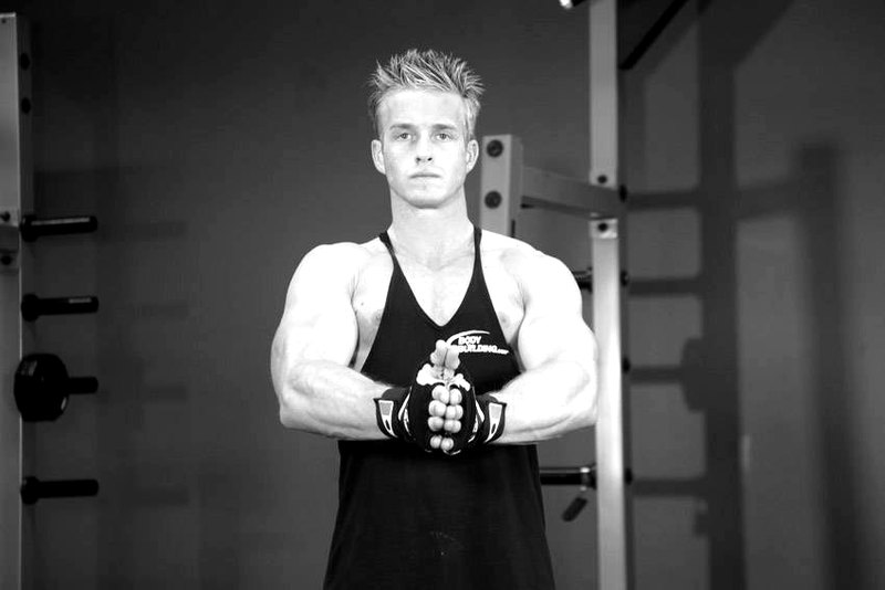 Isometric Chest Squeezes — end position demonstration photo
