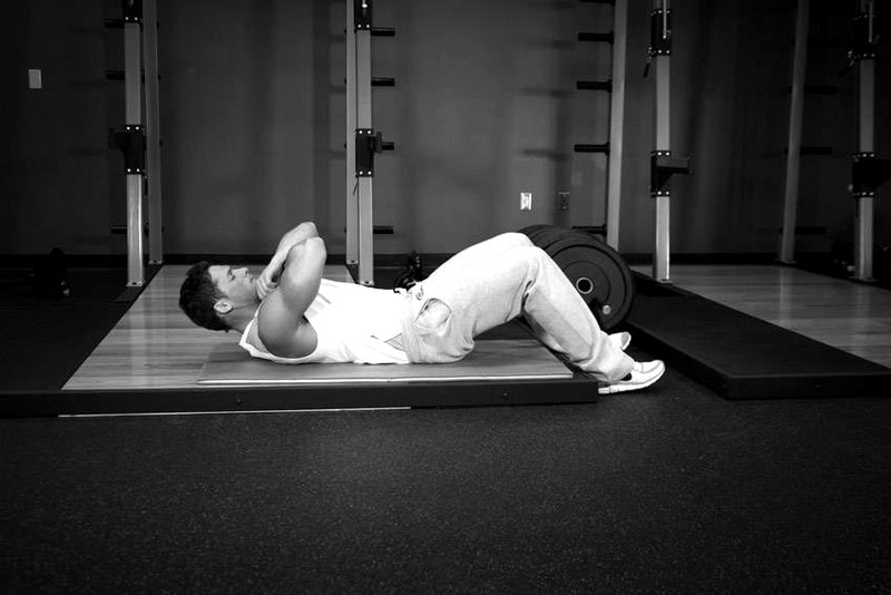 Janda Sit-Up — start position demonstration photo
