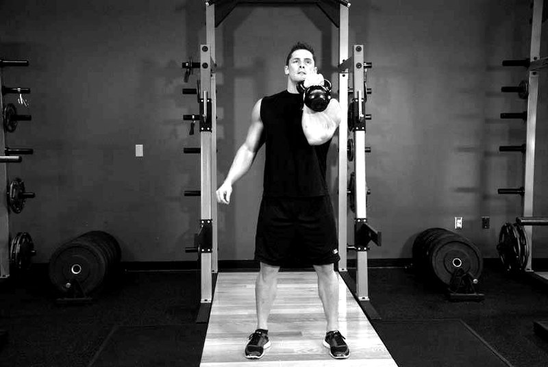 Kettlebell Arnold Press — start position demonstration photo